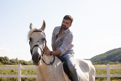 Man riding horse