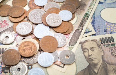 High angle view of coins