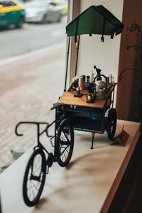 Bicycle with toy on street in city