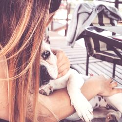 Close-up of woman with dog