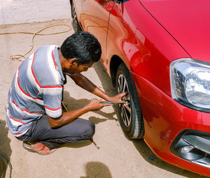 Man working in car