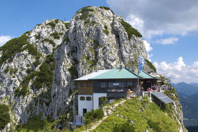 Panoramic view of buildings and mountains against sky