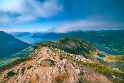 Aerial view of mountain range against sky