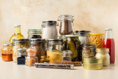 Close-up of glass jar on table