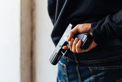 Close-up of man holding camera
