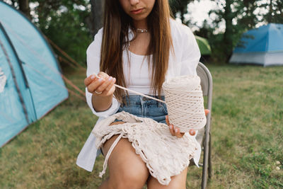 Young woman using mobile phone