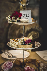 Flowers in plate on table