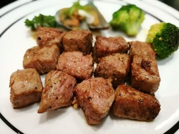 Close-up of served food in plate