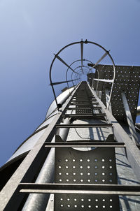 Low angle view of ladder against clear sky
