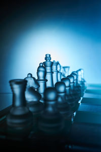 Close-up of chess pieces against white background