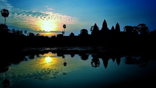 Reflection of sky in water at sunset