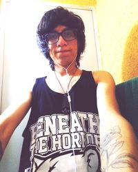 Portrait of young woman in sunglasses