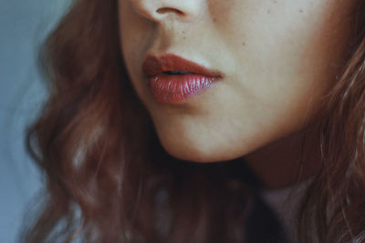 Close-up of young woman with lipstick