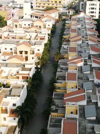 High angle view of street amidst buildings in town