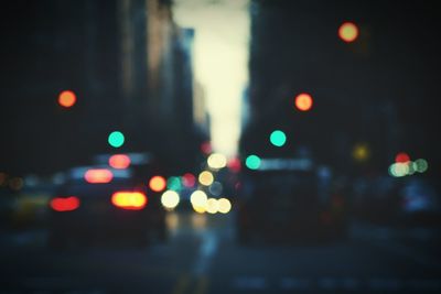 Defocused image of illuminated city at night