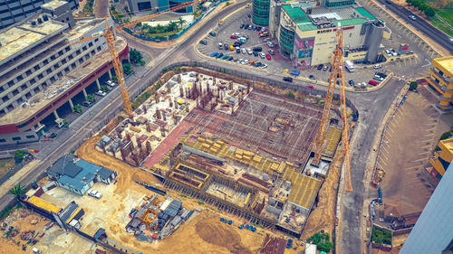 High angle view of vehicles on road in city