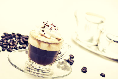 Close-up of coffee cup on table