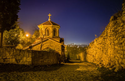 Illuminated historic building against sky at night