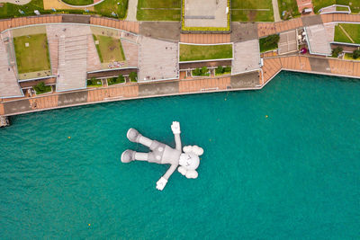 High angle view of man swimming in pool