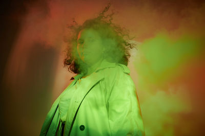 Young woman portrait, on colorful background