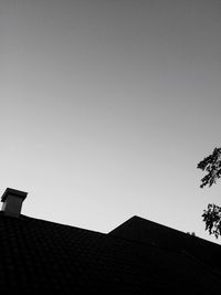 Low angle view of silhouette mountain against sky