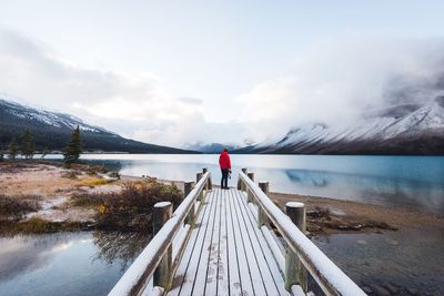 Man on pier over bow lake