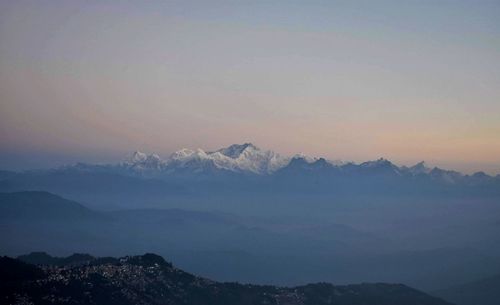 Scenic view of mountains against sky during sunset