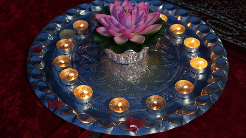 High angle view of illuminated lantern on table