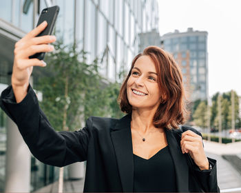 Young woman using mobile phone