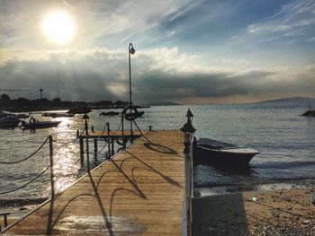 View of pier on calm sea against the sky