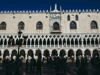 Group of people in front of building