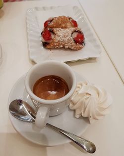 High angle view of cake in plate on table