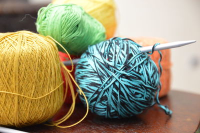 Close-up of wool balls on table