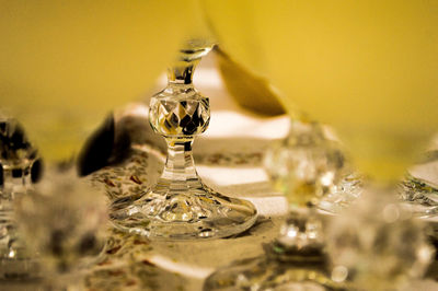 Close-up of glass decoration on table
