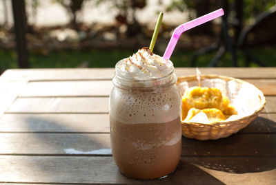 Close-up of smoothie in mason jar on table