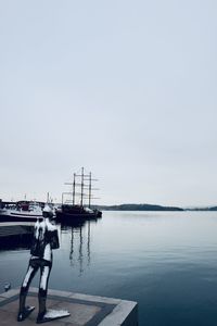 Pier on sea against sky