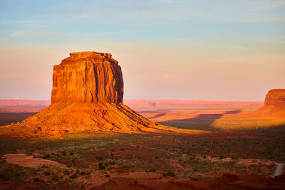 Scenic view of landscape against sky during sunset