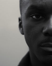 Close-up portrait of a serious young man