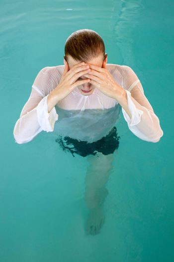 High angle view of man swimming in pool