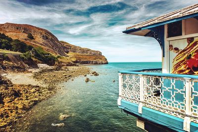 Scenic view of bay against sky