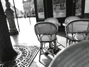 Close-up of chairs and table in cafe
