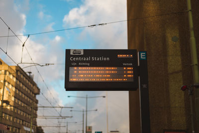 Low angle view of transport update digital signboard