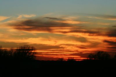 Scenic view of dramatic sky during sunset