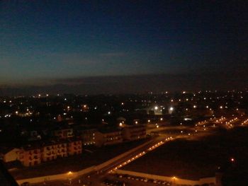 View of illuminated cityscape at night