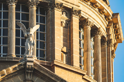 Low angle view of statue of historic building