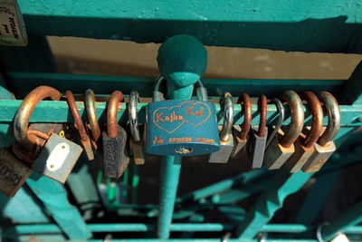 Close-up of padlock on metal gate