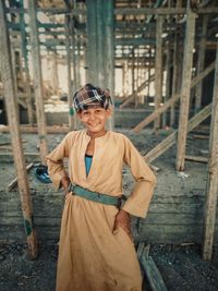 Portrait of young man standing in site