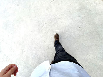 Low section of person standing on floor