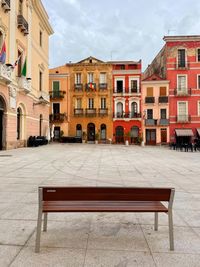 View of a bench in an italian village square