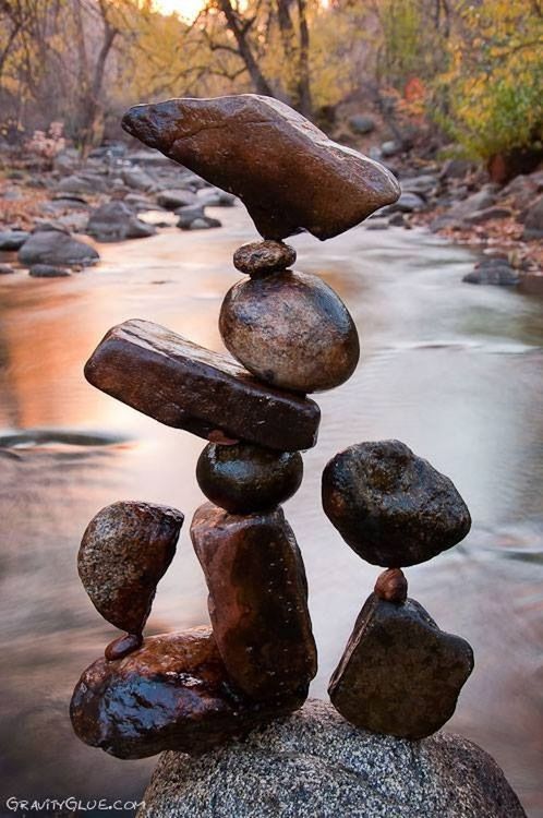 water, rock - object, tranquility, balance, stone - object, reflection, stack, nature, pebble, lake, stone, focus on foreground, close-up, tranquil scene, day, beauty in nature, outdoors, rock, no people, log